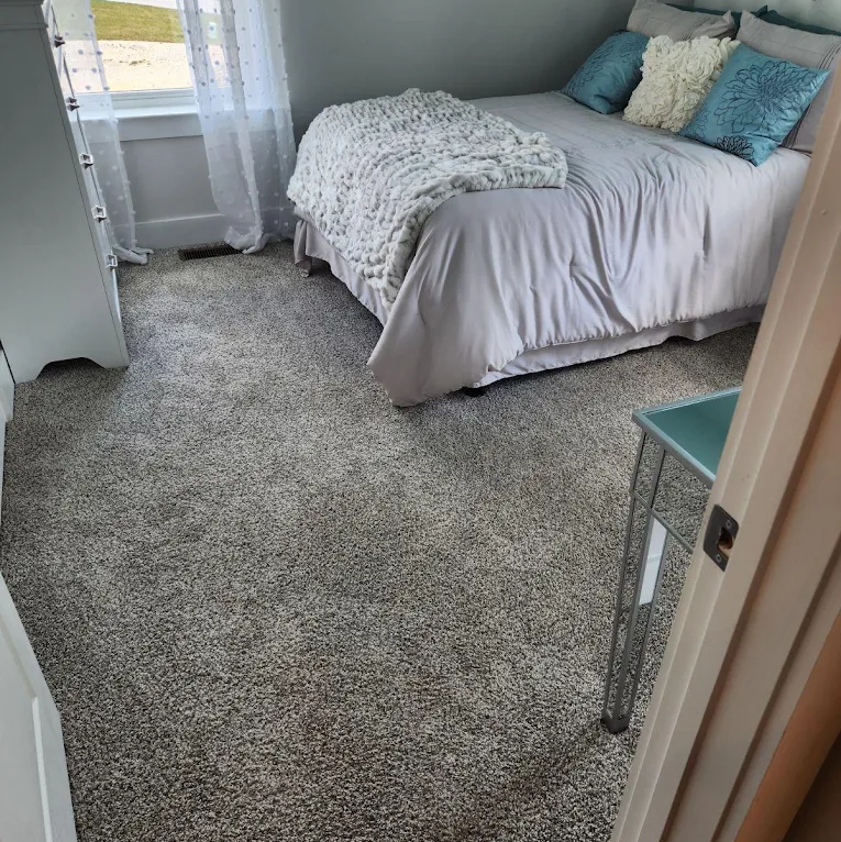 Carpet installation in bedroom by Carpet Concepts
